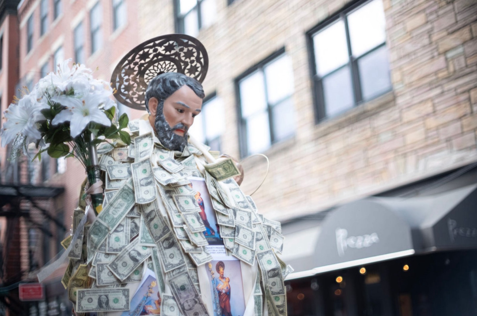 Saint Joseph statue with offerings
